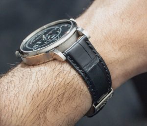 The male copy watches have black straps.
